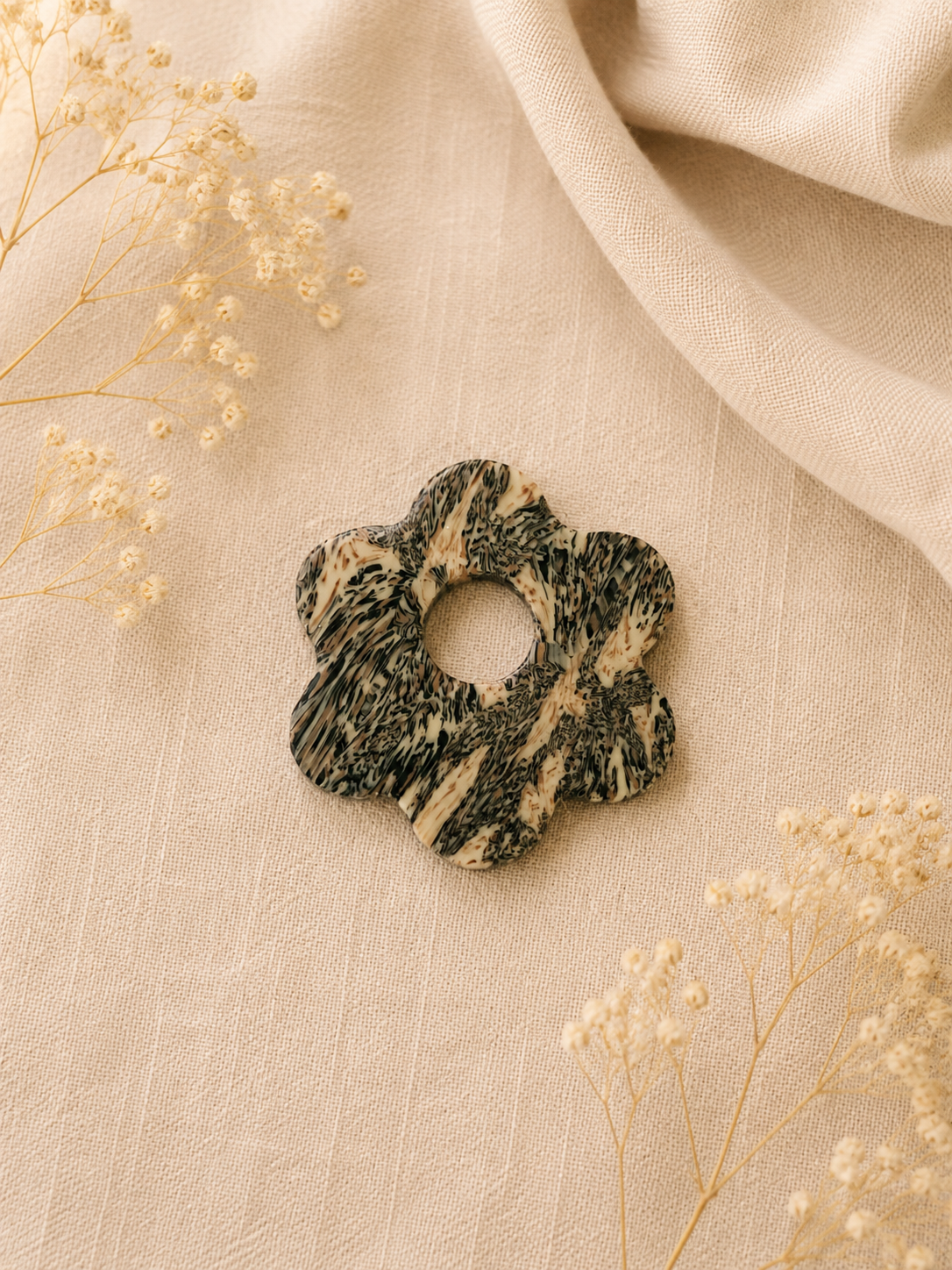 Broche à lunette fleur marbrée