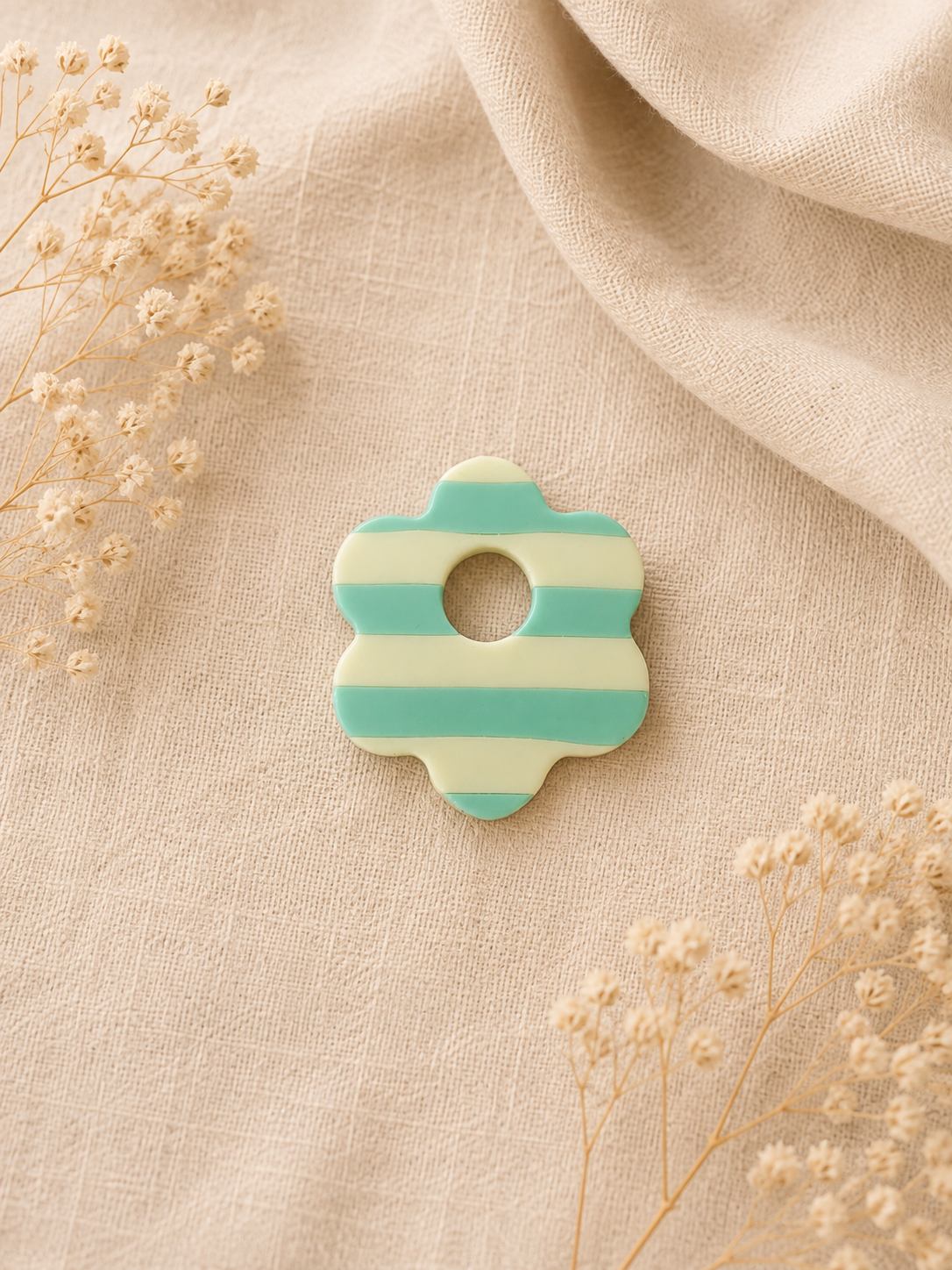 Broche à lunette fleur rayée
