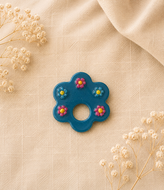 Broche à lunette fleur bleu