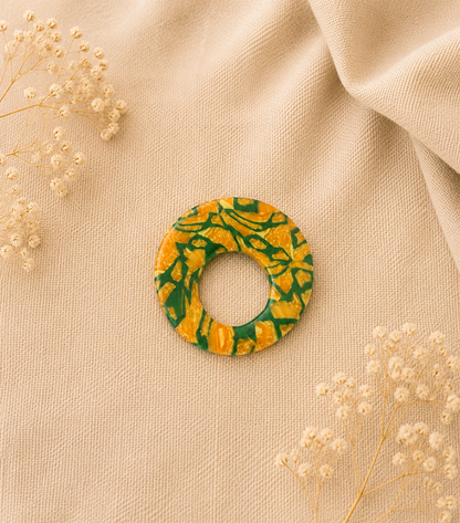 Broche à lunette ronde marbrée vert jaune
